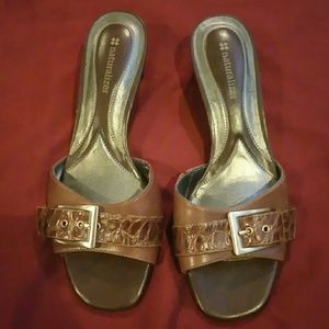 Dark brown very low heel.